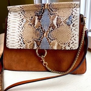 Chloe style bag . Faux snake skin ,leather and suede .Adjustable shoulder strap.
